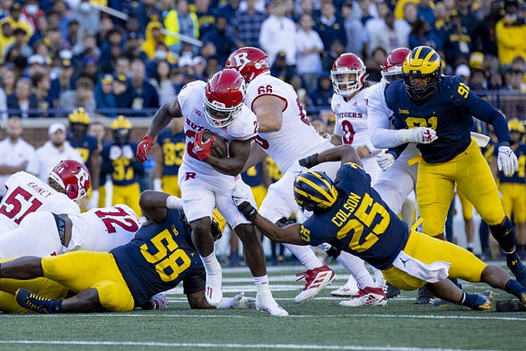 Mazi Smith (58), Junior Colson (25), and Taylor Upshaw (91)