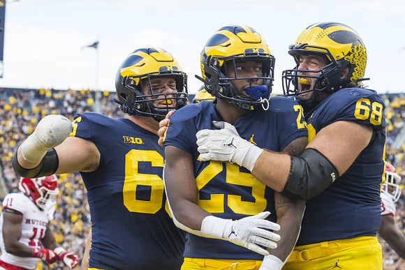 Chuck Filiaga (66), Hassan Haskins (25), and Andrew Vastardis (68)