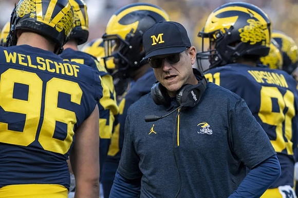 Julius Welschof (96), Jim Harbaugh, and Taylor Upshaw (91)