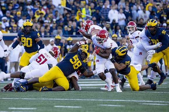Mike Morris (90), Mazi Smith (58), Junior Colson (25), and Taylor Upshaw (91)