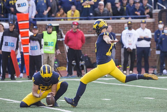 Brad Robbins (91), and Jake Moody (13)