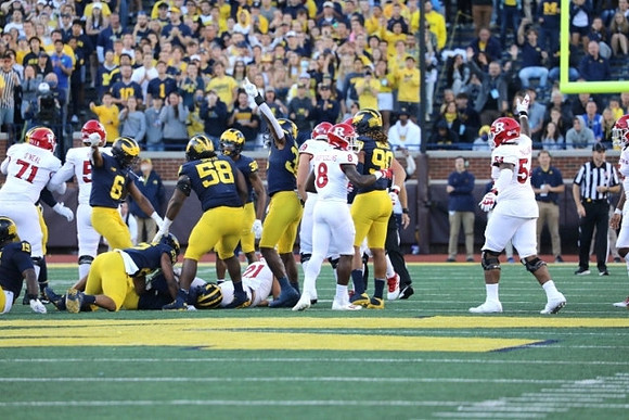 Christopher Hinton (15), R.J. Moten (6), Mazi Smith (58), Daxton Hill (30), and Mike Morris (90)