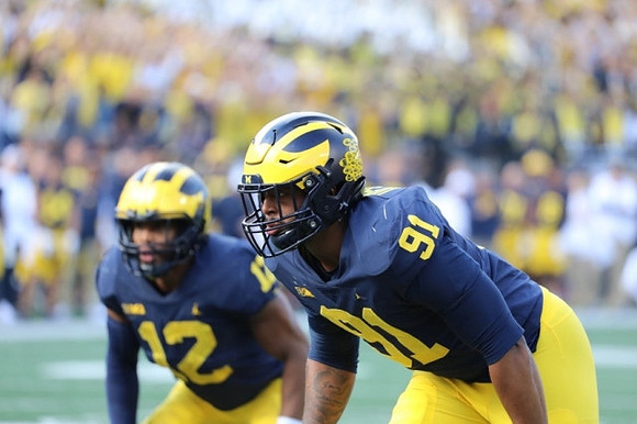 Josh Ross (12), and Taylor Upshaw (91)