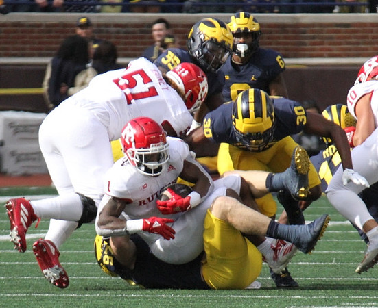 Aidan Hutchinson (97), Daxton Hill (30), David Ojabo (55), and R.J. Moten (6)