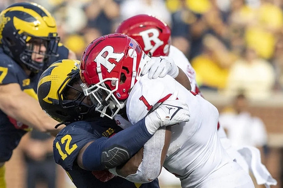 Aidan Hutchinson (97), and Josh Ross (12)