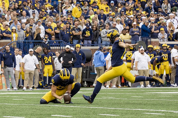 Brad Robbins (91), and Jake Moody (13)