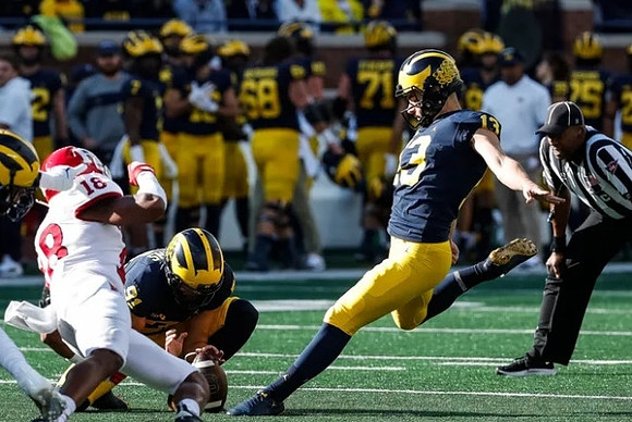 Brad Robbins (91), and Jake Moody (13)
