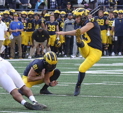 Brad Robbins (91), and Jake Moody (13)