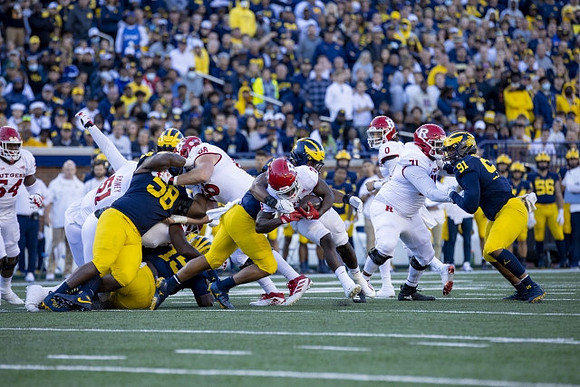 Mazi Smith (58), Junior Colson (25), and Taylor Upshaw (91)