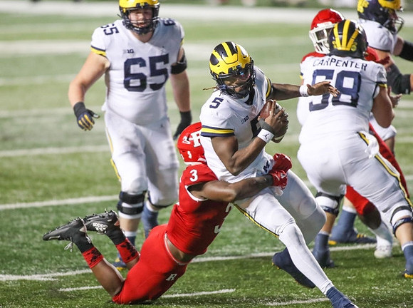 Zak Zinter (65), Joe Milton (5), and Zach Carpenter (58)