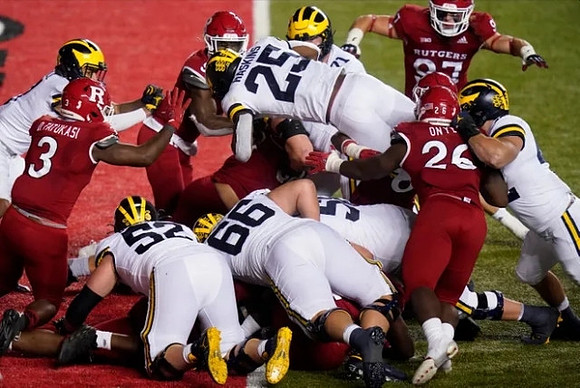 Karsen Barnhart (52), Chuck Filiaga (66), Hassan Haskins (25), and Andrew Stueber (71)