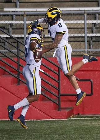 Cornelius Johnson (6) and Ronnie Bell (8)