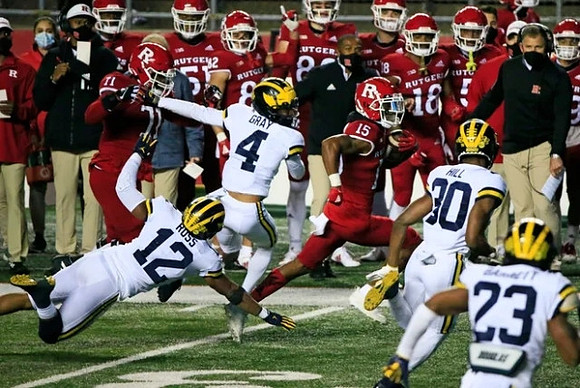 Josh Ross (12), Vincent Gray (4), Daxton Hill (30), Michael Barrett (23), and Rutgers Head Coach Greg Schiano