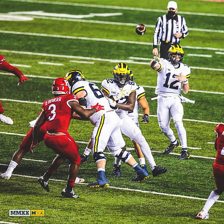 Nick Eubanks (82) and Cade McNamara (12)