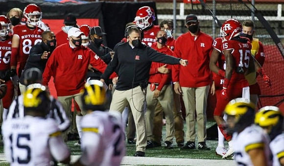 Christopher Hinton (15), Carlo Kemp (2), and Rutgers Head Coach Greg Schiano