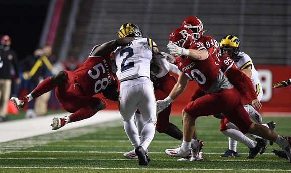 Nate Schoenle (81) and Blake Corum (2)