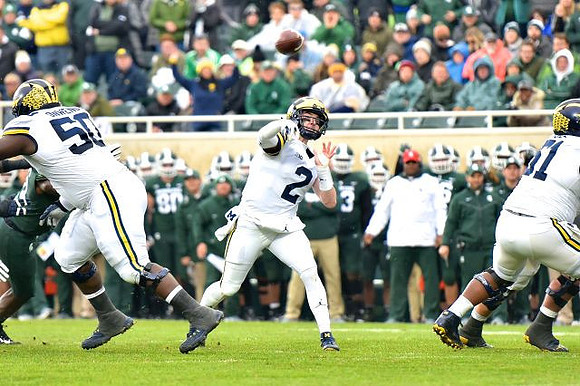 Michael Onwenu (50), Shea Patterson (2), and Cesar Ruiz (51)