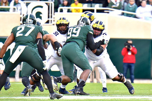 Cesar Ruiz (51) and Ben Bredeson (74)