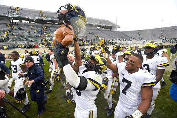 Michigan Team and Paul Bunyan Trophy