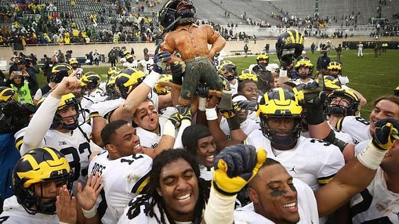 Michigan Team and Paul Bunyan Trophy