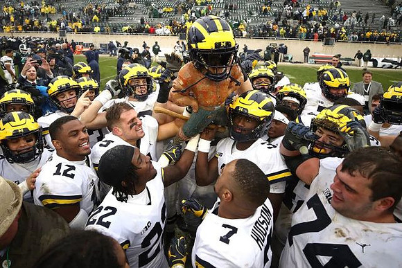 Michigan Team and Paul Bunyan Trophy