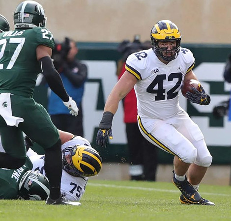 Jon Runyan Jr. (75) and Ben Mason (42)