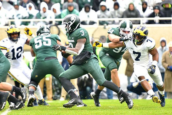 Josh Ross (12) and Khaleke Hudson (7)