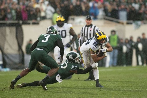 Michael Onwenu (50) and Grant Perry (88)