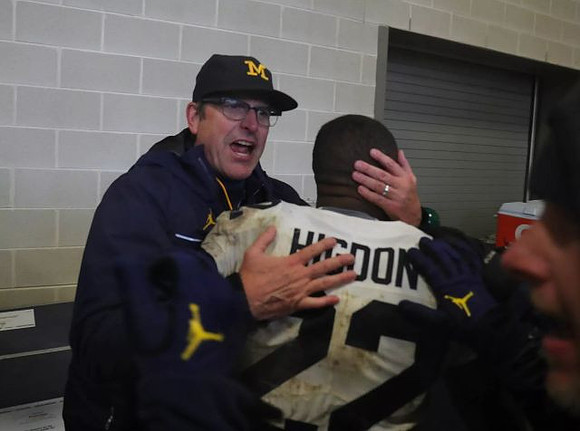 Jim Harbaugh and Karan Higdon (22)