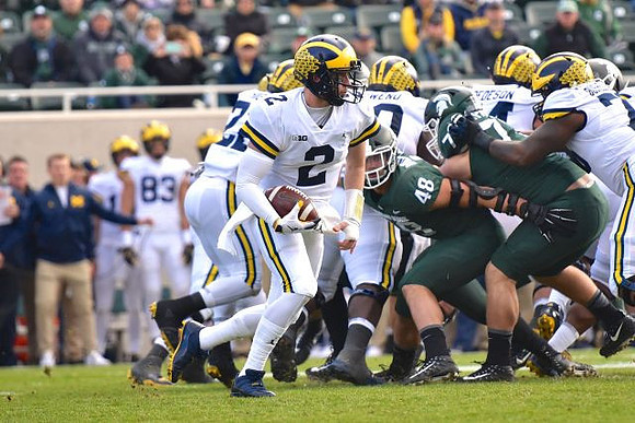 Shea Patterson (2), Michael Onwenu (50), Ben Bredeson (74), and Juwann Bushell-Beatty (76)