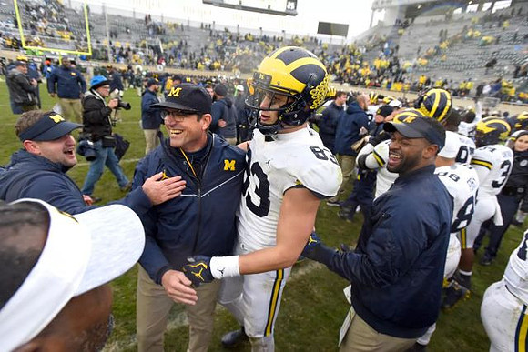 Jim Harbaugh and Zach Gentry (83)