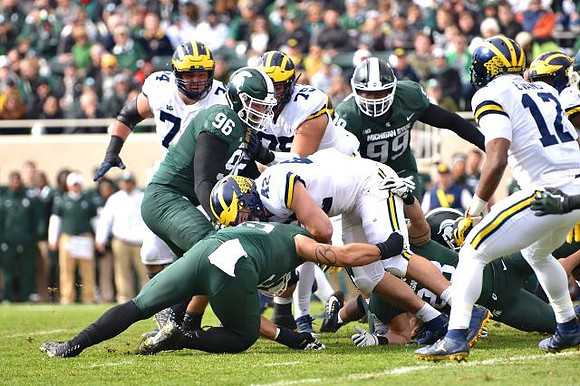 Ben Bredeson (74), Jon Runyan Jr. (75), Ben Mason (42), and Chris Evans (12)