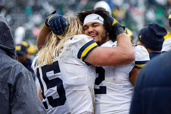 Chase Winovich (15) and Carlo Kemp (2)