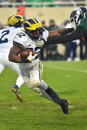 Shea Patterson (2) and Karan Higdon (22)