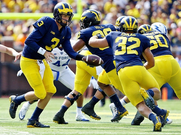 Wilton Speight (3), Khalid Hill (80), Ty Isaac (32), and Michael Onwenu (50)
