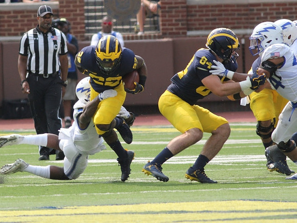Karan Higdon (22) and Sean McKeon (84)