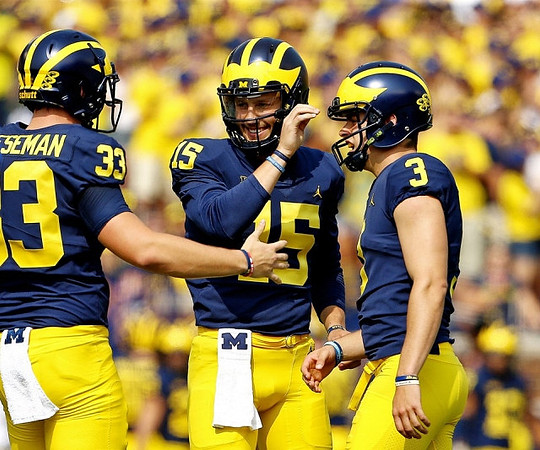 Camaron Cheeseman (33), Garrett Moores (15), and Quinn Nordin (3)