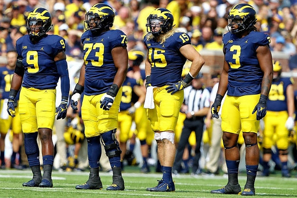 Mike McCray (9), Maurice Hurst (73), Chase Winovich (15), and Rashan Gary (3)