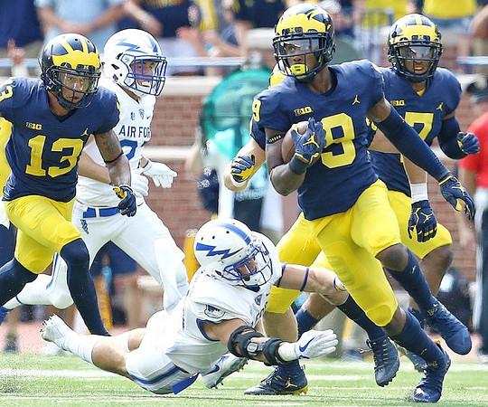 Eddie McDoom (13), Donovan Peoples-Jones (9), and Tarik Black (7)