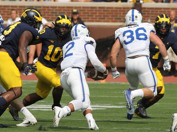 Wilton Speight (3), Devin Bush (10), and Tarik Black (7)