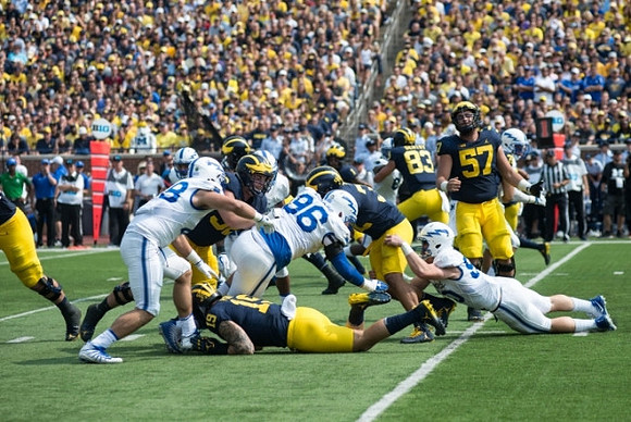 Henry Poggi (19), Zach Gentry (83), and Patrick Kugler (57)