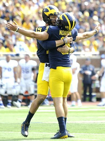 Garrett Moores (15) and Quinn Nordin (3)