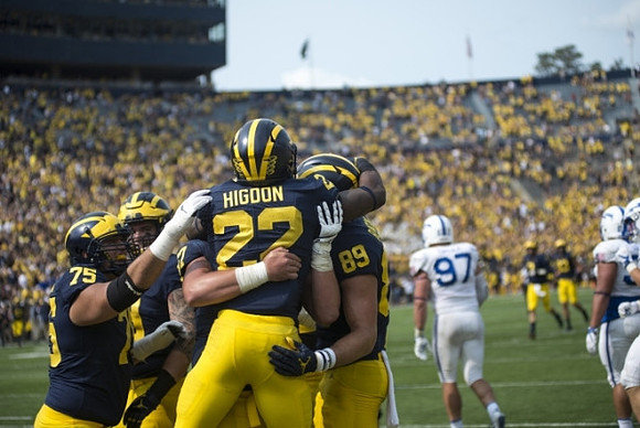 Jon Runyan Jr. (75), Karan Higdon (22), and Ian Bunting (89)