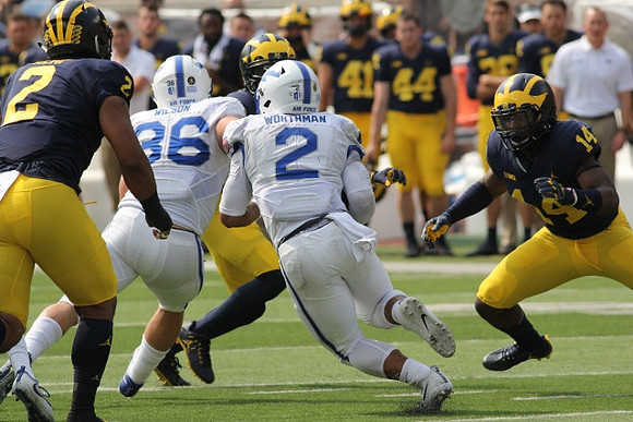 Carlo Kemp (2) and Josh Metellus (14)