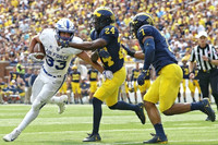Lavert Hill (24) and Khaleke Hudson (7)