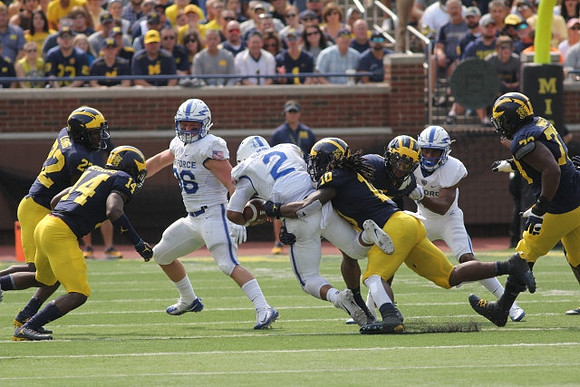 David Long (22), Josh Metellus (14), Devin Bush (10), and Maurice Hurst (73)