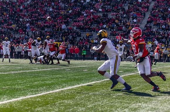 Jake Moody (2), Michael Onwenu (50), Donovan Peoples-Jones (9), and Ronnie Bell (8)