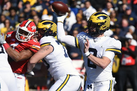 Jalen Mayfield (73) and Shea Patterson (2)
