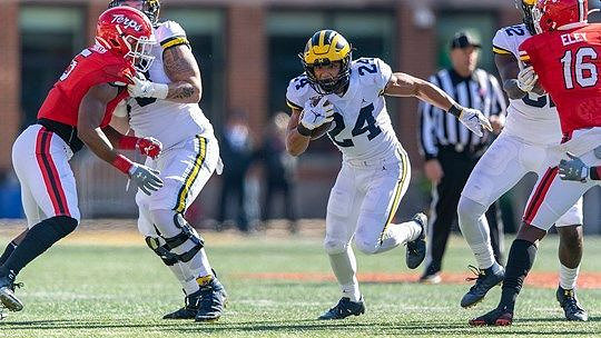 Zach Charbonnet (24) and Nick Eubanks (82)