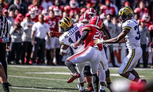 Josh Metellus (14) and Daxton Hill (30)